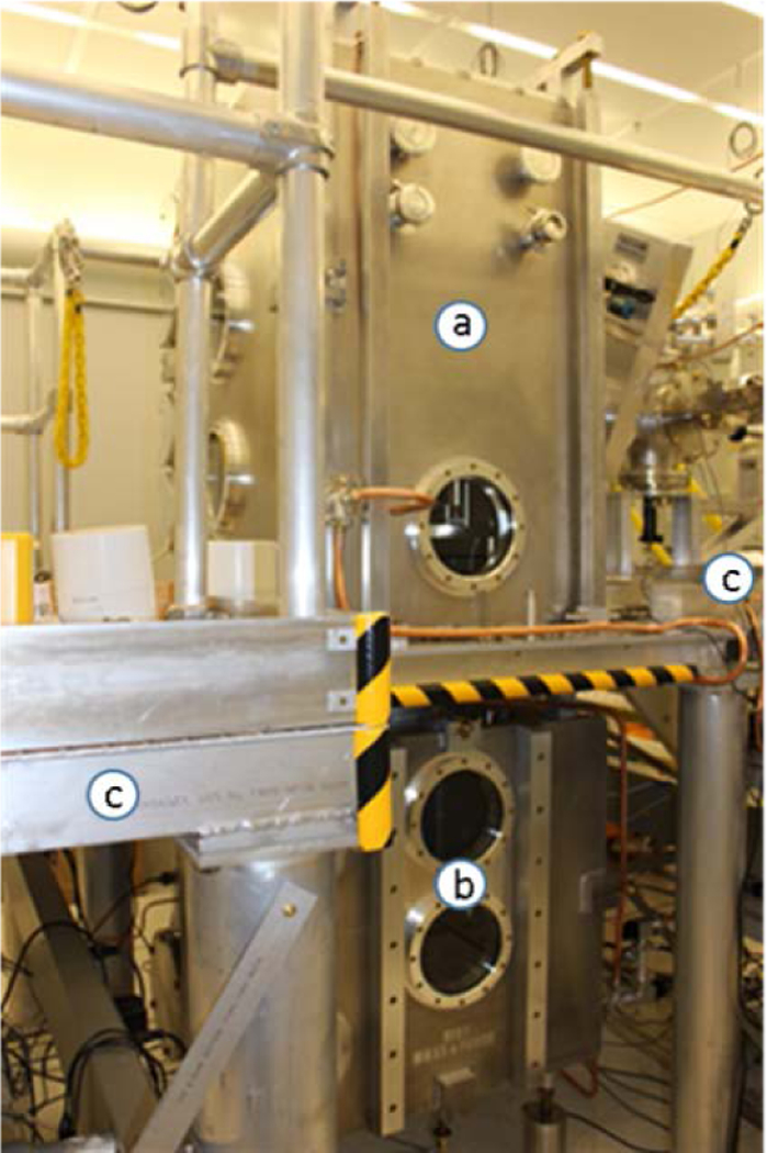 Progress on vacuum-to-air mass calibration system using magnetic suspension to disseminate the Planck-constant realized kilogram.