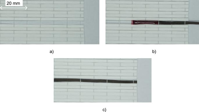 Capacitance measurements on integrated conductors for detection of matrix cracks in GFRP