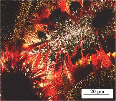 Structure and redox ratio of soda-lime-silica glasses with high iron oxide concentrations