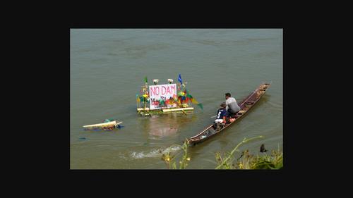 Hybrid governance, environmental justice, and hydropower development in the Mekong transboundary commons