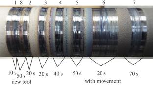 Structure and Microhardness of Steel R6M5 Coating after Spraying and Subsequent Friction Treatment