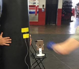 Sparring with technology: collaborating with coaches, mentors, and academic staff to develop culturally responsive computing education for a youth boxing program