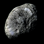 Mapping Hyperion in Projections of the Triaxial Ellipsoid Based on a New Reference Network and a Digital Terrain Model