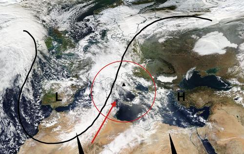 The correlation of long-range Saharan dust advections with the precipitation and radiative budget in the Central Mediterranean