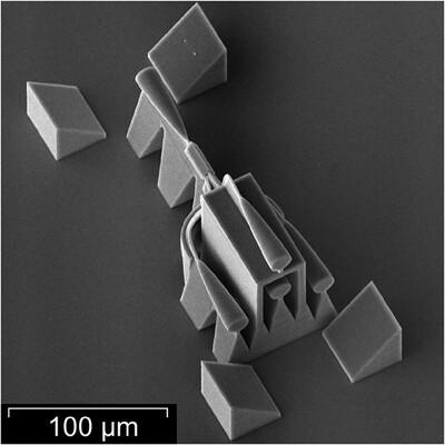 Ultracompact 3D Splitter for Single-Core to Multi-Core Optical Fiber Connections Fabricated Through Direct Laser Writing in Polymer