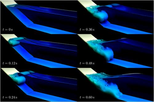 Physical Model of Landslide-Generated Impulse Waves: Experimental Investigation of the Wave-Granular Flow Coupling