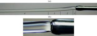 Experimental Investigation of the Mechanisms of Spontaneous Bending of a Viscous Jet