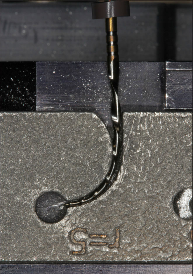 Influence of Thermal Pretreatments on the Cyclic Fatigue Resistance of Novel Reciprocating Nickel-Titanium Files: A Comparison of Low- and High-Temperature Modified Systems.