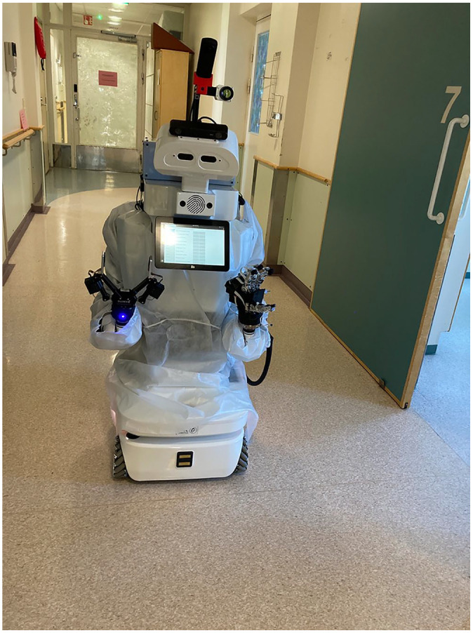 <i>Välkky</i>'s voyage on to a hospital ward: Expectations, explorations and emergent robocentric nursing care.