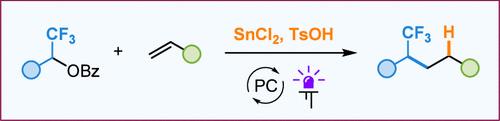 Photocatalytic Alkene Hydrofunctionalization with Benzoic Esters of Fluorinated Alcohols Mediated by Tin(II) Chloride
