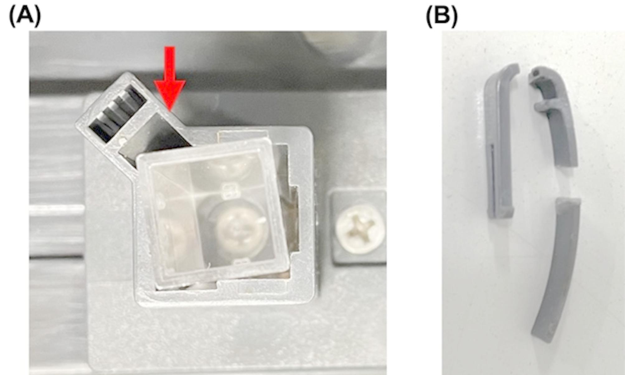 3D-printed cuvette holder clip for a spectrophotometer.