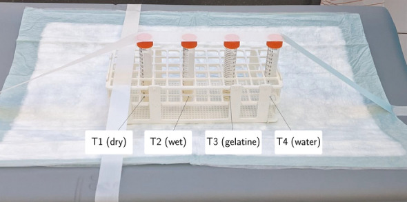 Phantom imaging demonstration of positronium lifetime with a long axial field-of-view PET/CT and <sup>124</sup>I.