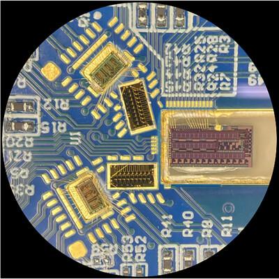 Integrated Photonics and Electronics for High-Speed Quantum Key Distribution