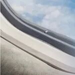 飞机舷窗上为什么会有个小洞